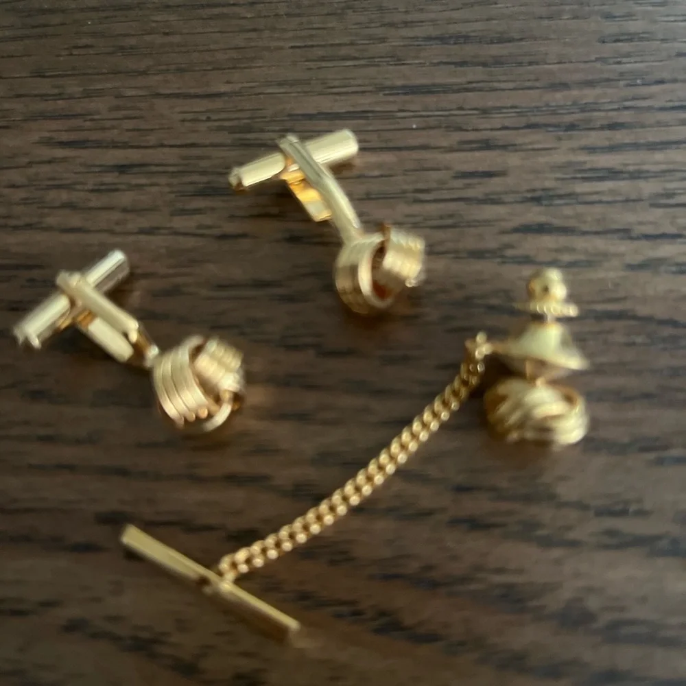 Vintage gold-tone cufflinks and matching tie clip set.  EUC